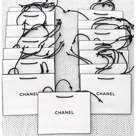 CHANEL Handbags - Chanel Bundle Lot of 15 White Black Trim Cosmetic Shopping Bags And Tissue Paper